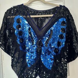 Vintage sequin blouse with a butterfly sequin print.